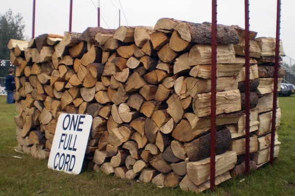 photo showing one full cord of wood stacked